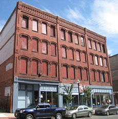 The former Surplus Office Supply, 37 Washington St., will have retail space on the first floor and 18 loft-style apartments above.