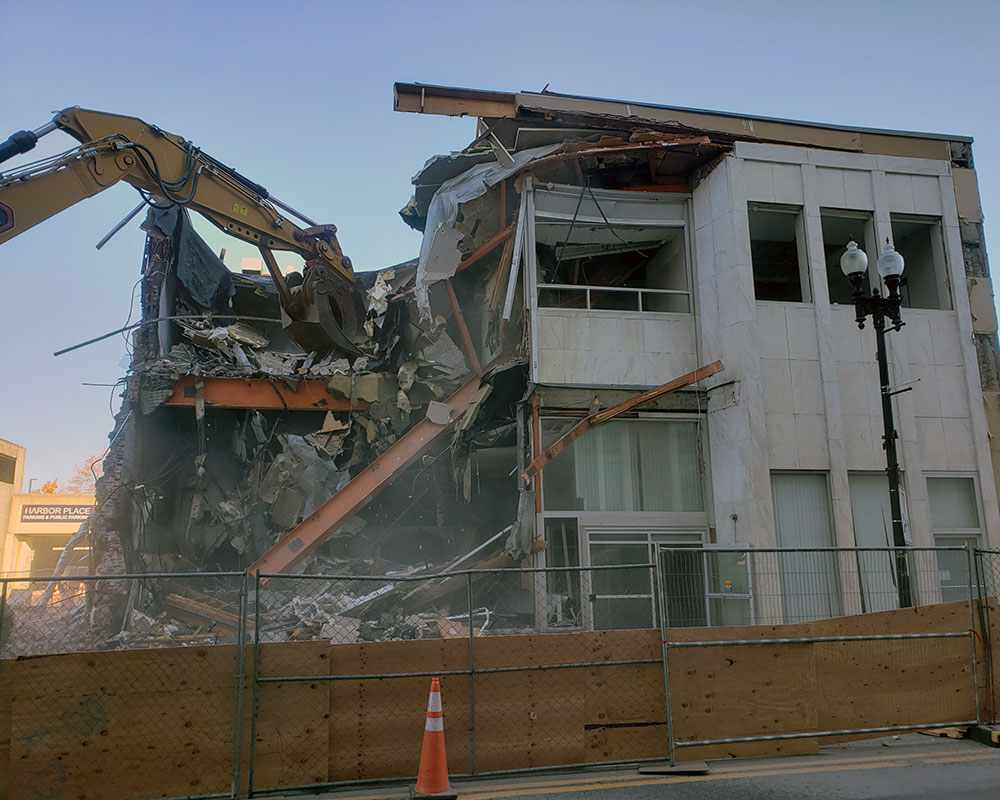 Old Bank Headquarters Comes Down; Site and Current Bank Could Be Added to Redevelopment Plans