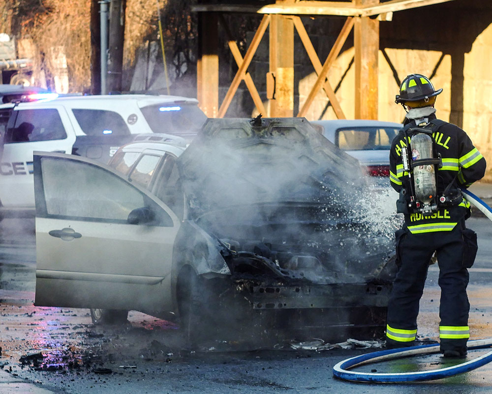 Haverhill Firefighters Use Tools to Free Occupant of Overturned Car; Separately Douse Car Fire