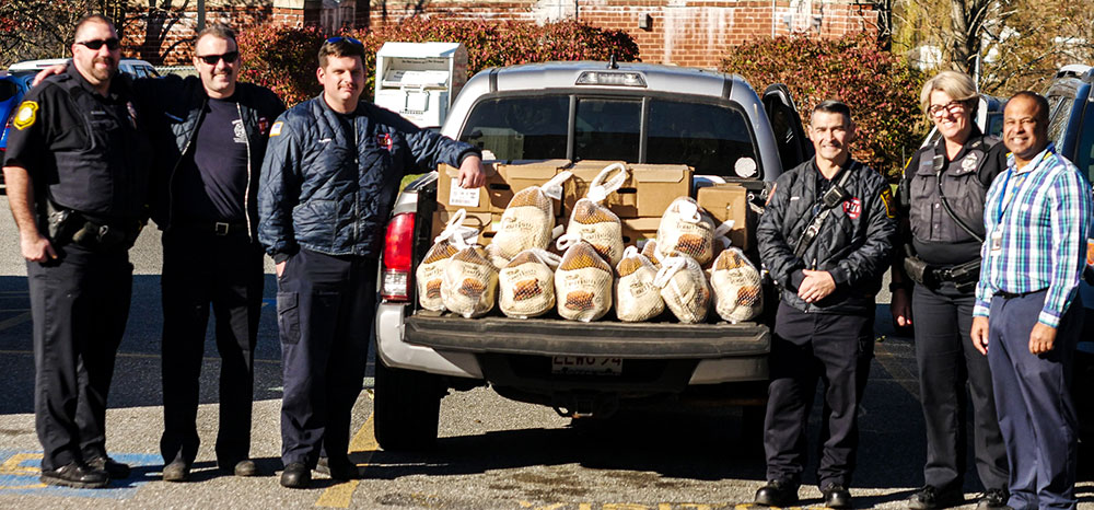 Last Minute Effort of Public Safety and School Teamwork Helps Feed More Than 70 Families