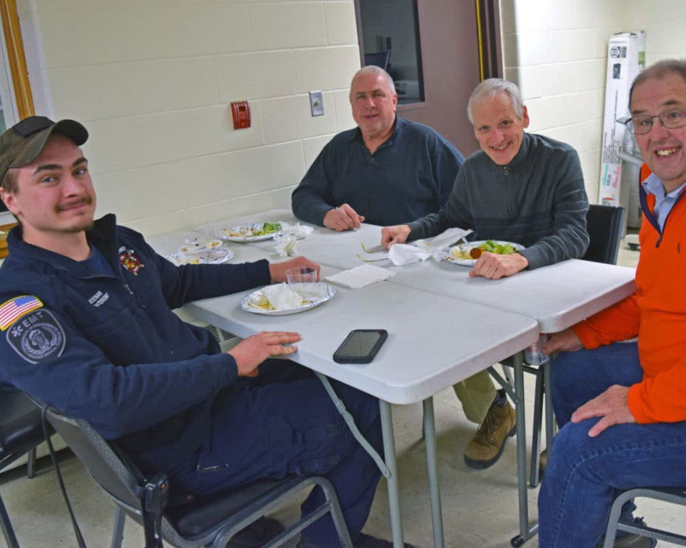 Groveland Firefighters Past and Present Trade Stories as Holiday Potluck Dinner Returns